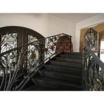 Classical rose bouquet decorating wrought iron handrail, staircase