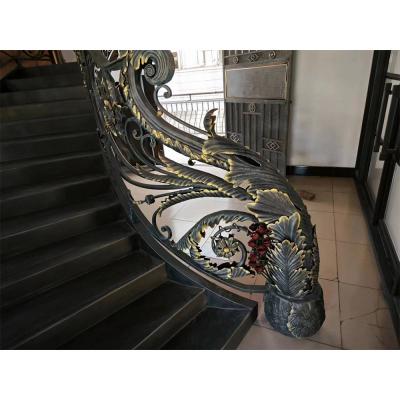 Classical rose bouquet decorating wrought iron handrail, staircase