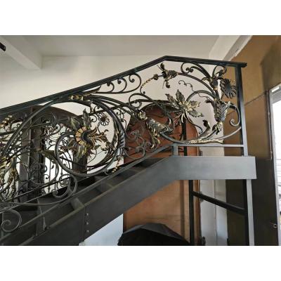 Classical rose bouquet decorating wrought iron handrail, staircase