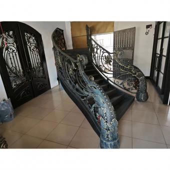 Classical rose bouquet decorating wrought iron handrail, staircase